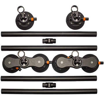 SeaSucker 48-inch Monkey Bars cross bars on a roof with vacuum mounts for versatile gear