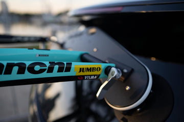 Two rear wheel straps are included to secure rear tires.