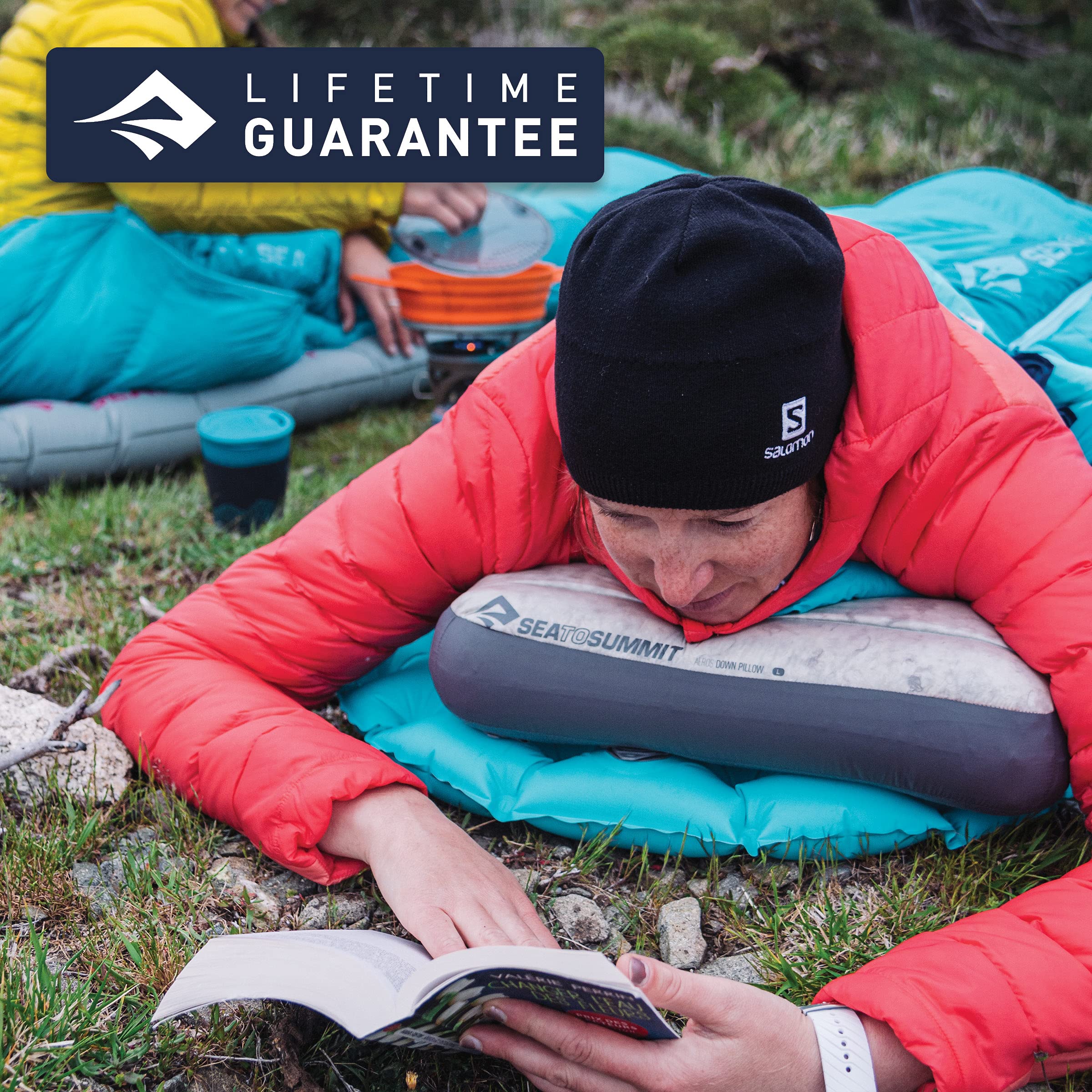 Sea to Summit Aeros Down Inflatable Pillow camping scene emphasizes lightweight comfort