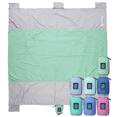 Seaview 180 beach blanket 6x7ft laid out on sand for a roomy family retreat.