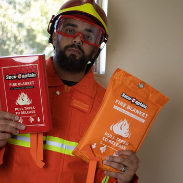 SecuCaptain emergency fire blanket 40x40 deployed to smother a small kitchen fire.