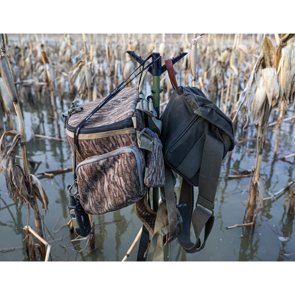 Gear Stick deployed in a marsh securing gear above water