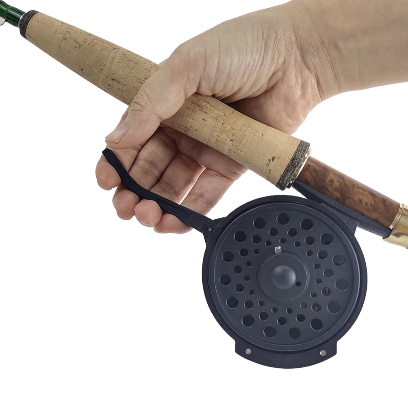 Reel in action with fly line and backing