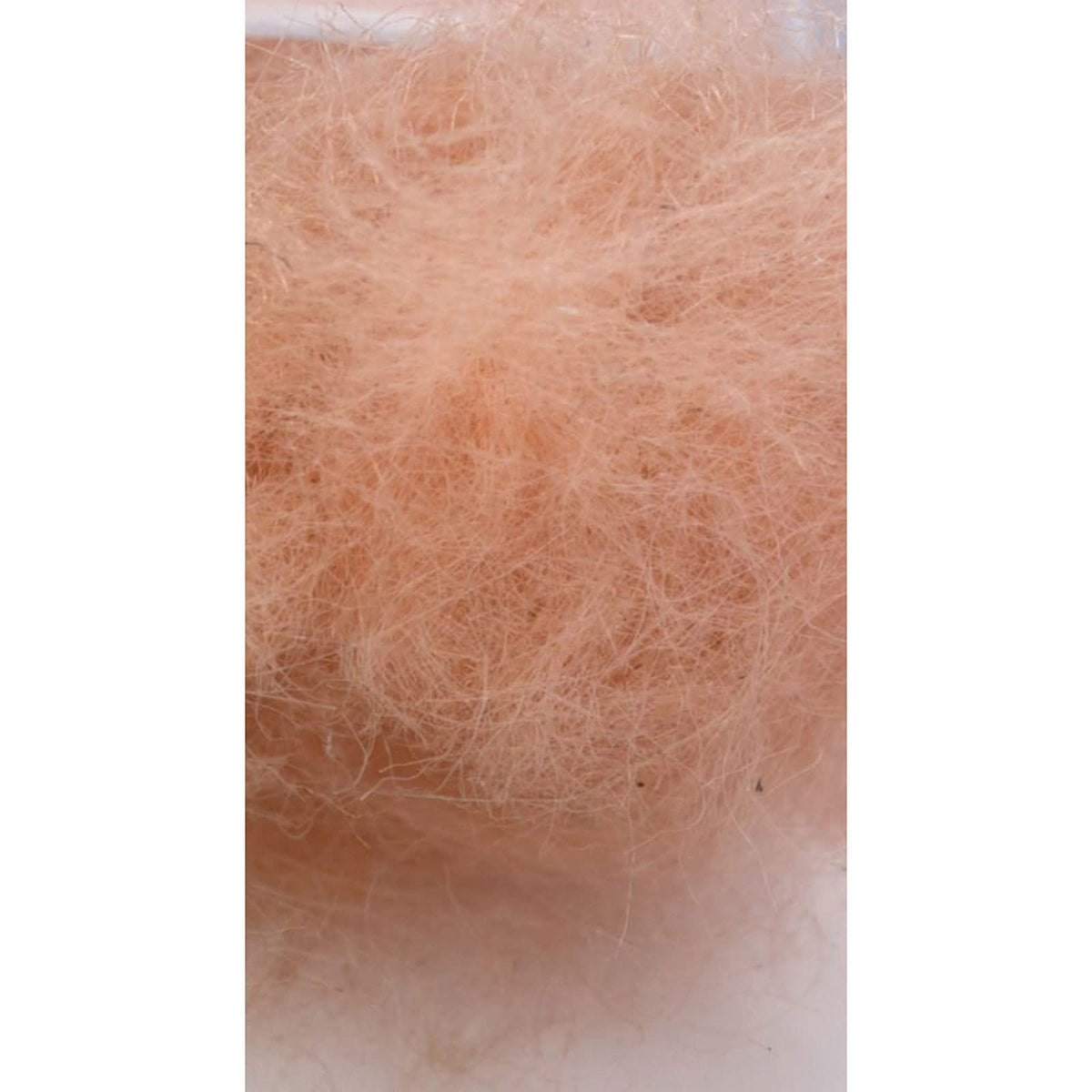 Semperfli Kapok dry fly dubbing Salmon boosts buoyancy for easier floating.