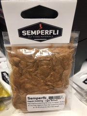 Semperfli Kapok Dubbing Light Brown close-up showing buoyant hollow fibers for improved dry fly flotation.