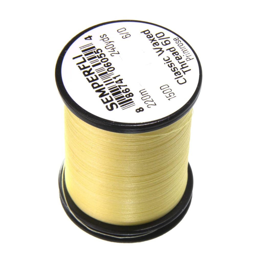 Semperfli waxed thread 6/0 Classic on a spool showing strong grip for fly tying.