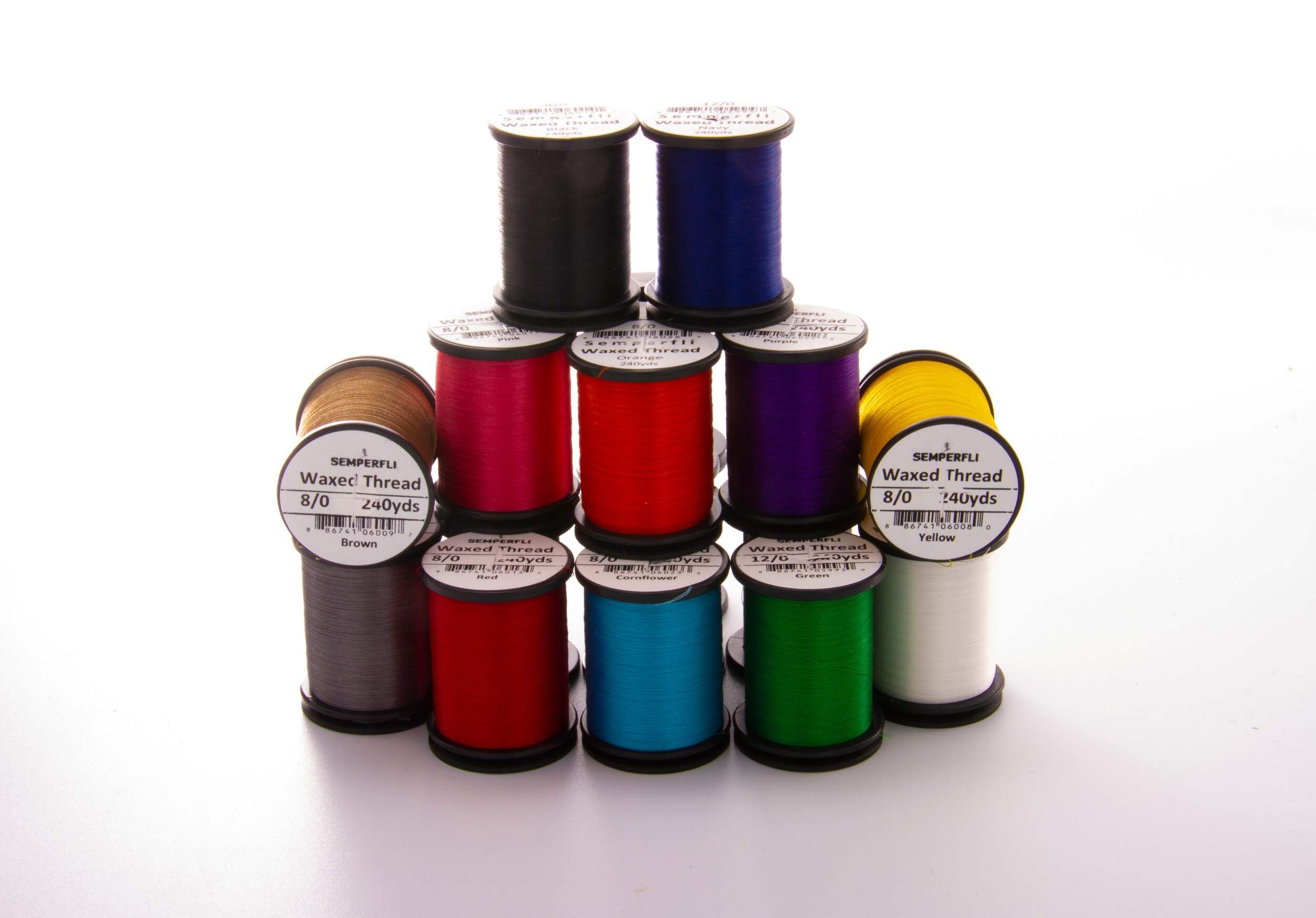 Semperfli Classic Waxed Thread in purple used on a fly-tying project for durability.