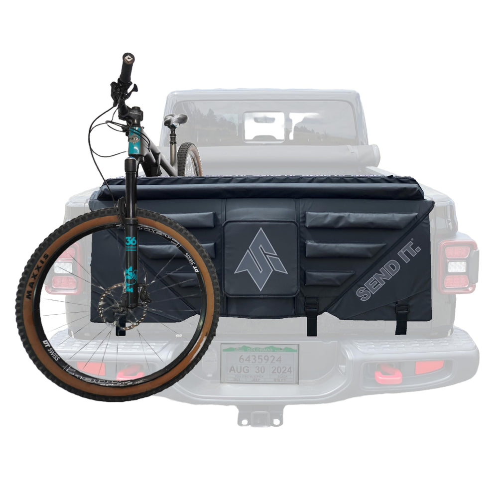 Send It High Roller Tailgate Pad V2 with open window for quick latch access.