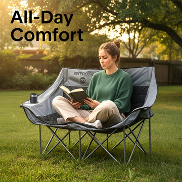 SereneLife camping loveseat outdoors on uneven ground with stable frame