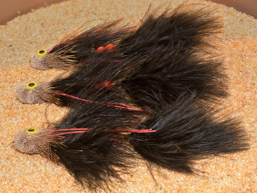 Articulated dual-hook streamer fly hand-tied for large freshwater species