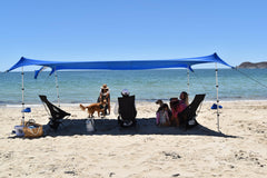 SHADE ECO Nomad XL family coverage under a large canopy for picnics.