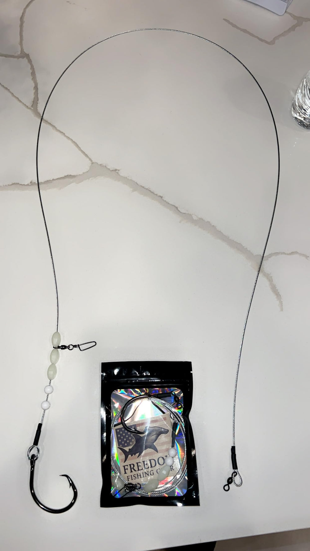 Close-up of 400 lb cable leader and inline 12/0 hook