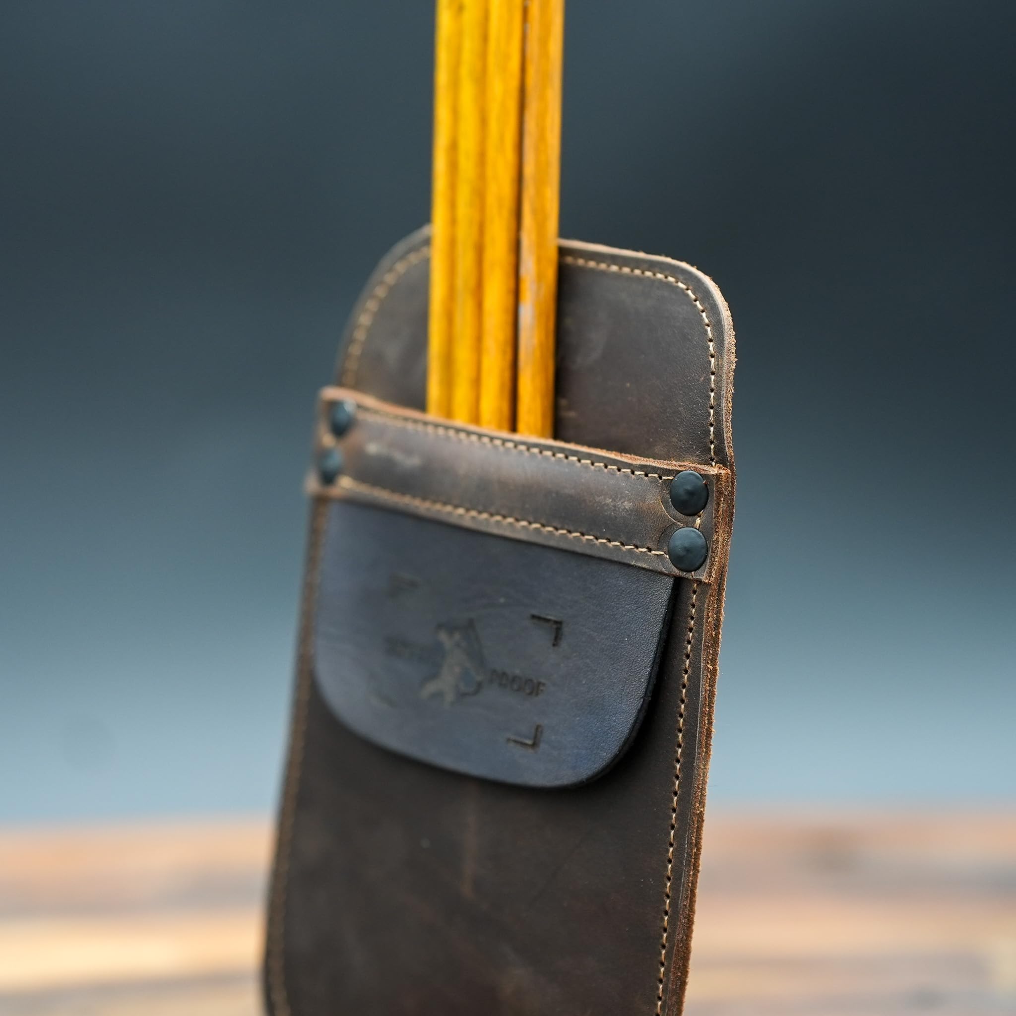 Shatterproof Archery Pocket Quiver leather texture highlighting durable USA-made craftsmanship.