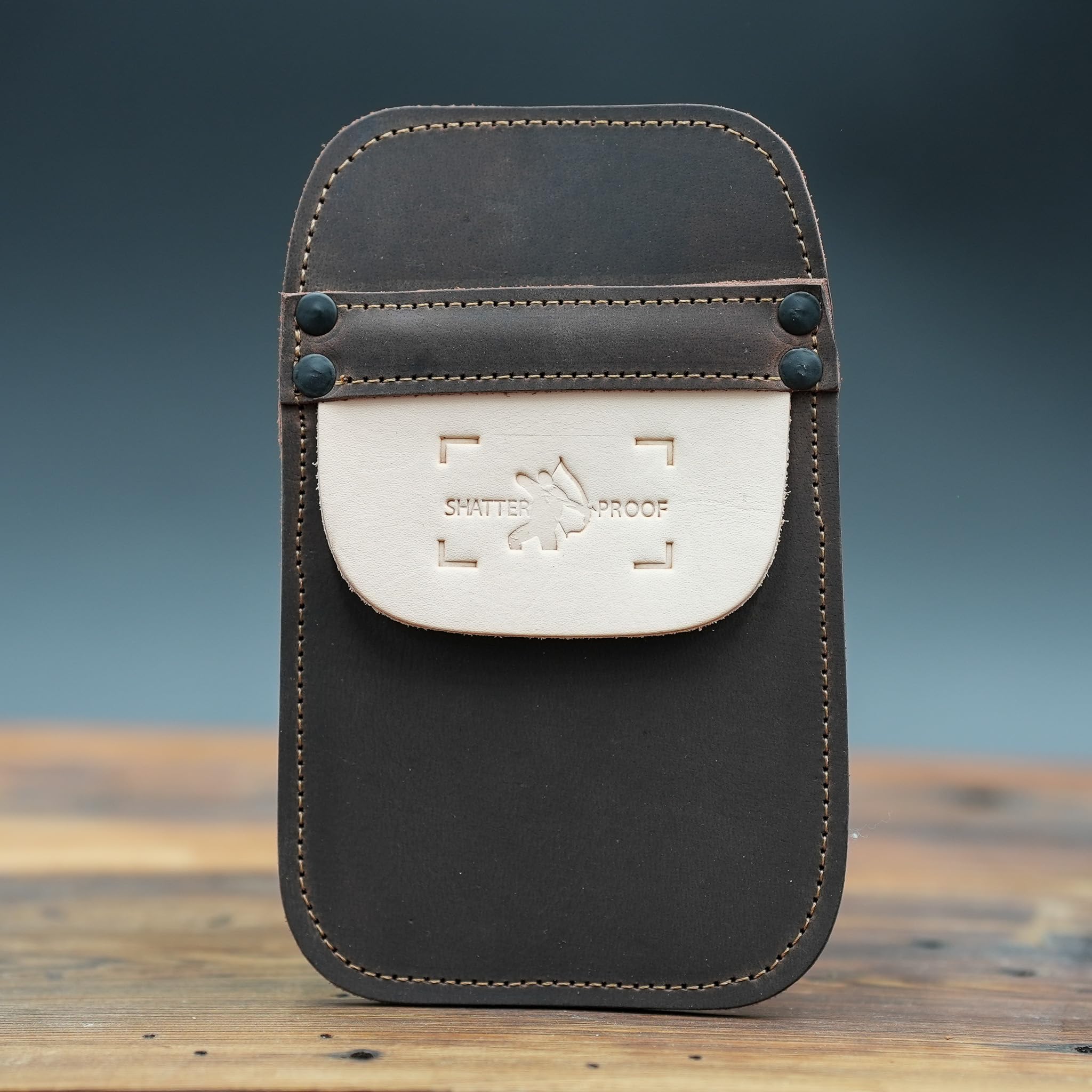 Shatterproof Archery pocket quiver leather detail stitching shows durability.