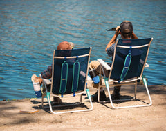 Shibumi Shade lightweight 8-pound chair with padded straps for easy beach portability.