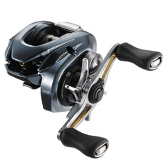 Close-up of SHIMANO Aldebaran BFS 2022 XG Left Grey fishing reel showing body, spool, and handle.