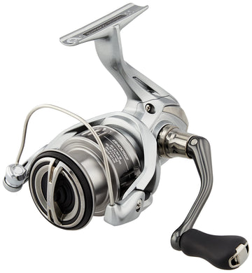 Shimano Nasci 2500HG ambidextrous reel in hand for versatile casting.