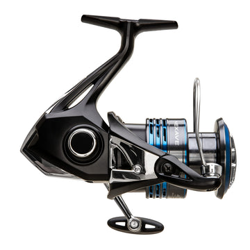 SHIMANO Nexave 4000HG FI reel in hand demonstrating size and grip.