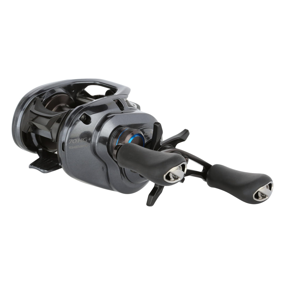 SHIMANO SLX70HGA reel in hand, showcasing compact low-profile design
