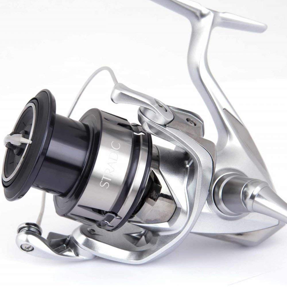 Shimano Stradic FL 1000 ambidextrous handle closeup enabling easy left-right hand use.