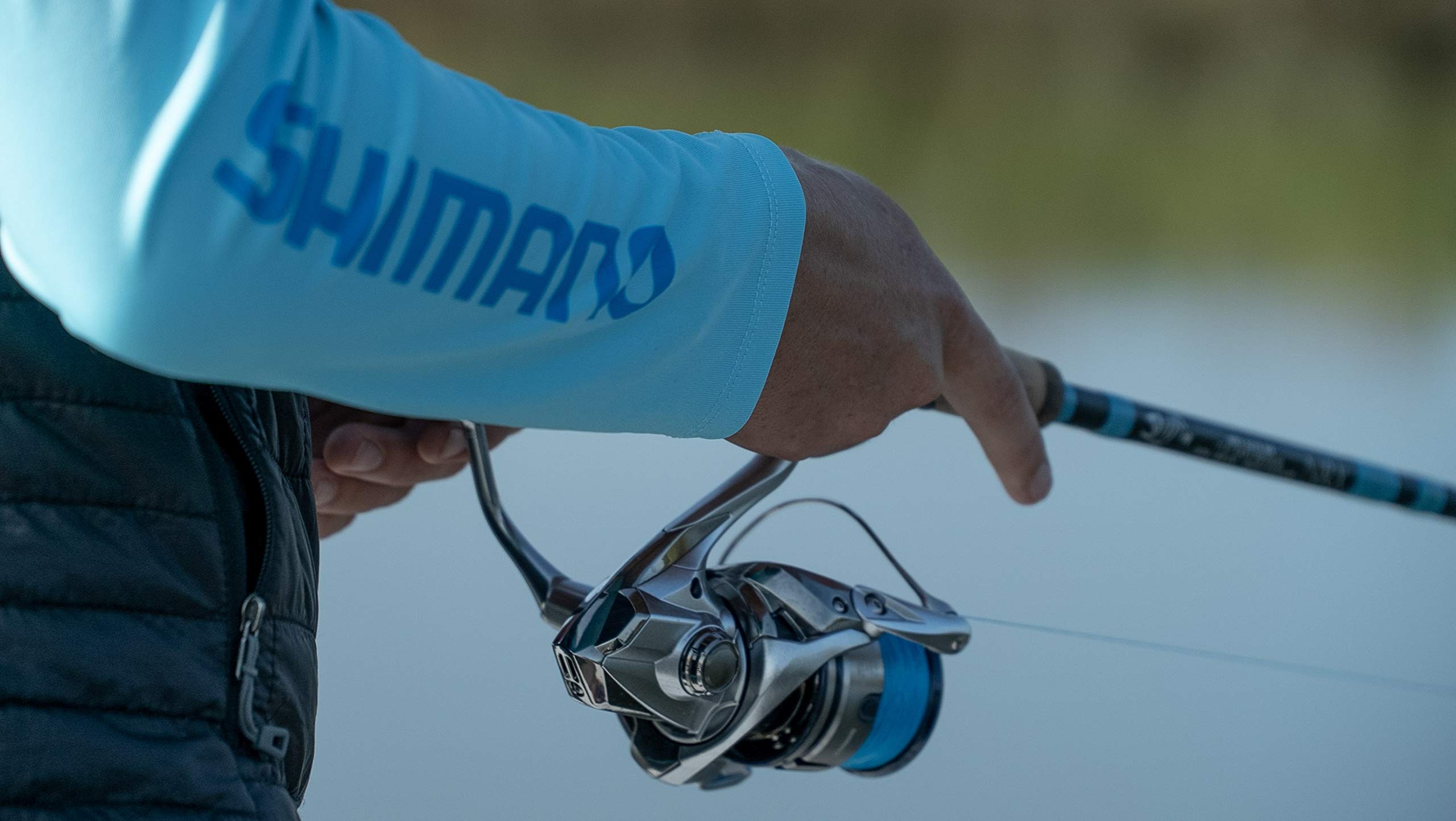 Shimano Stradic FL drag lever close-up for precise control during retrieves.