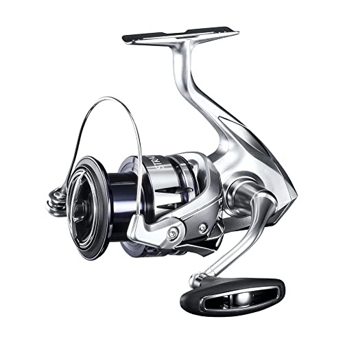 Shimano Stradic FL reel in use showcases ergonomic grip and comfortable cranking.