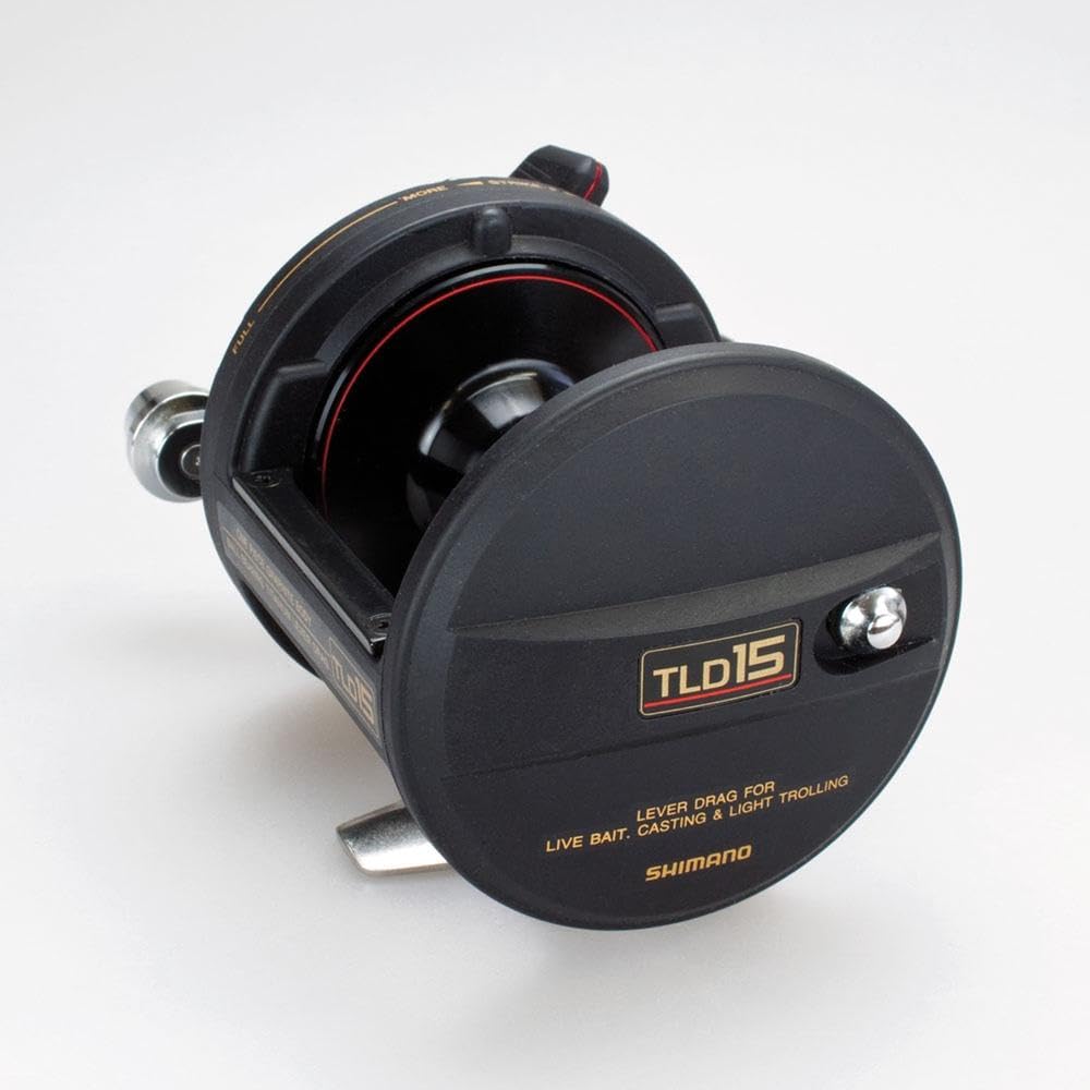 Shimano TLD15 graphite titanium body close up emphasizes lightweight corrosion resistance.