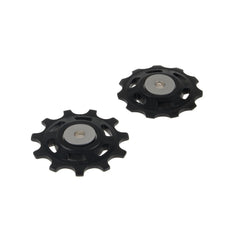 Close-up of Shimano XT M8000 pulley wheels highlighting durable aluminum construction.