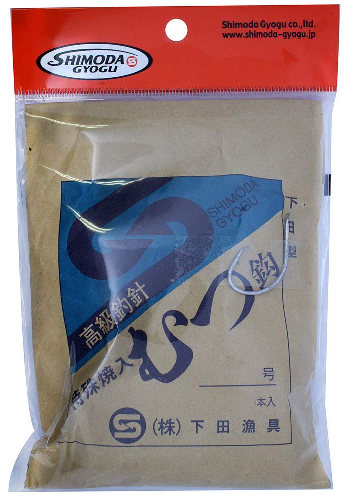 Shimoda Fishing Gear HP shimoda-shaped diaper needles on regular surface for precise tackle maintenance.