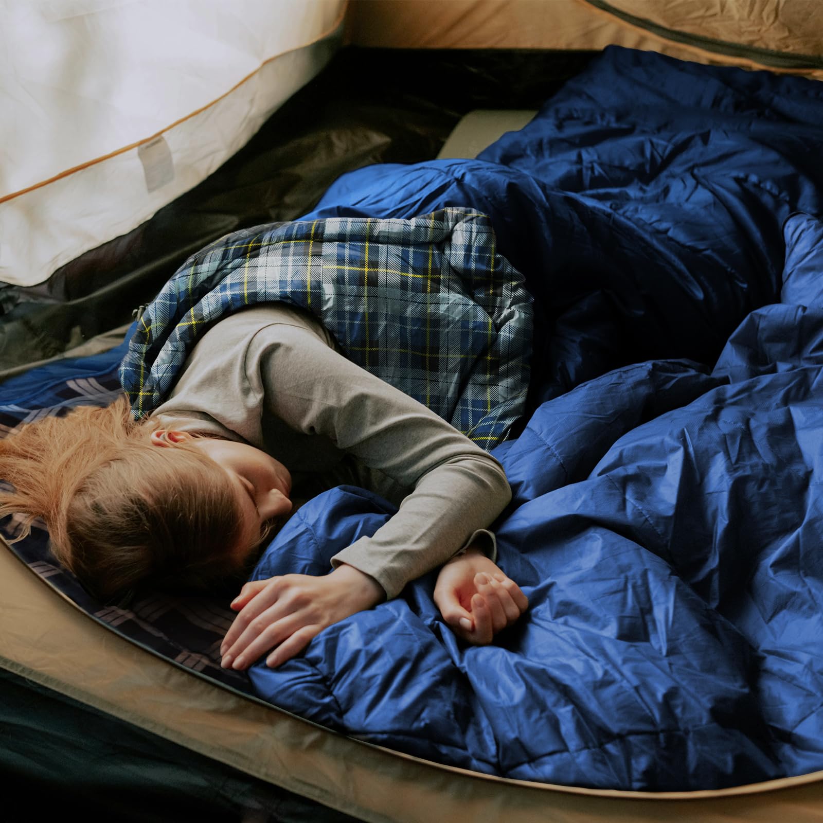 ShinHye sleeping bag navy fabric texture emphasizes durable warmth.