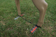 Shooter Grandstand base-legs on hard surface demonstrates portable setup without stakes.