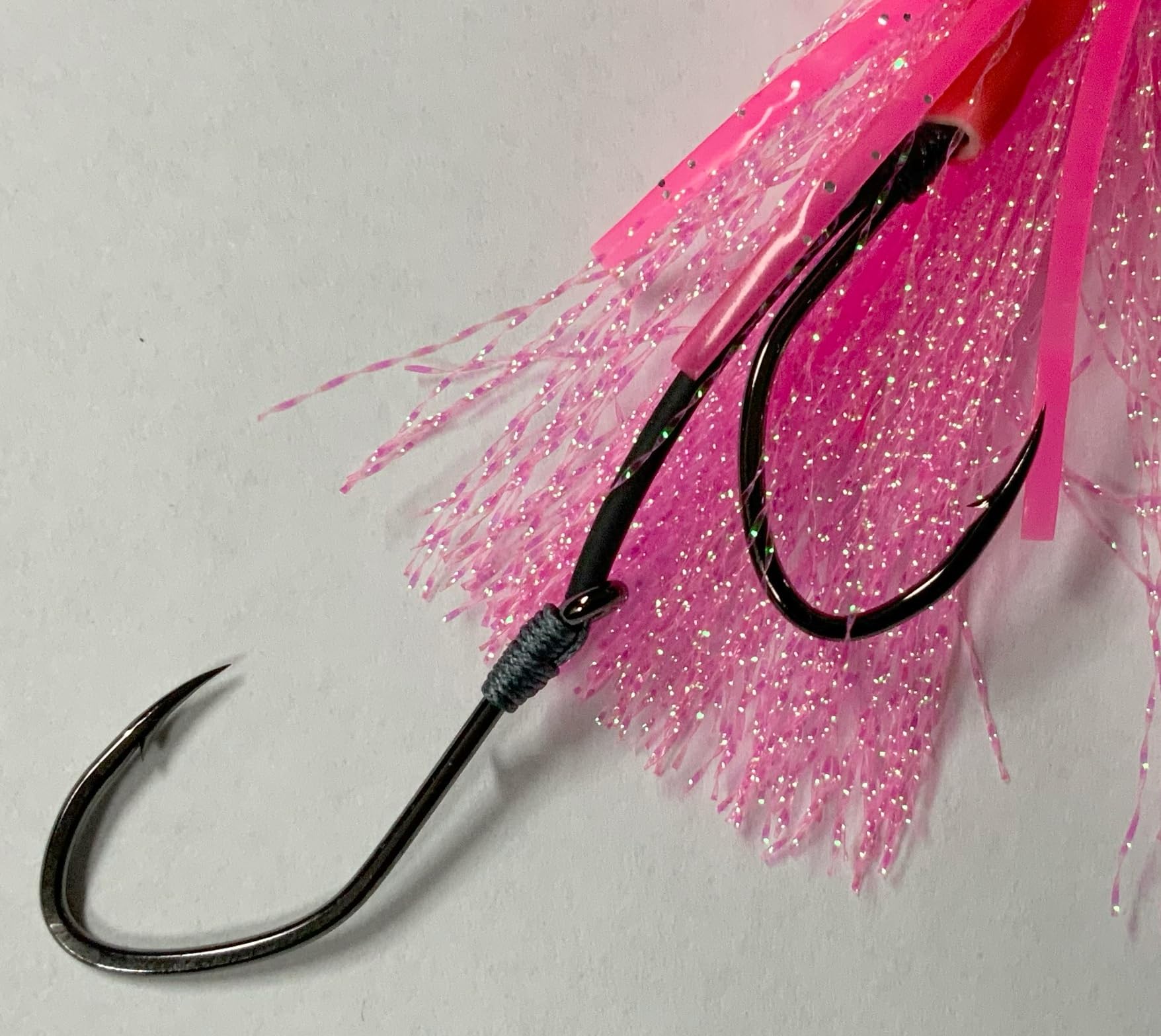 Durable construction and shimmering tinsel on the Shortbus Squid Skirt lure.