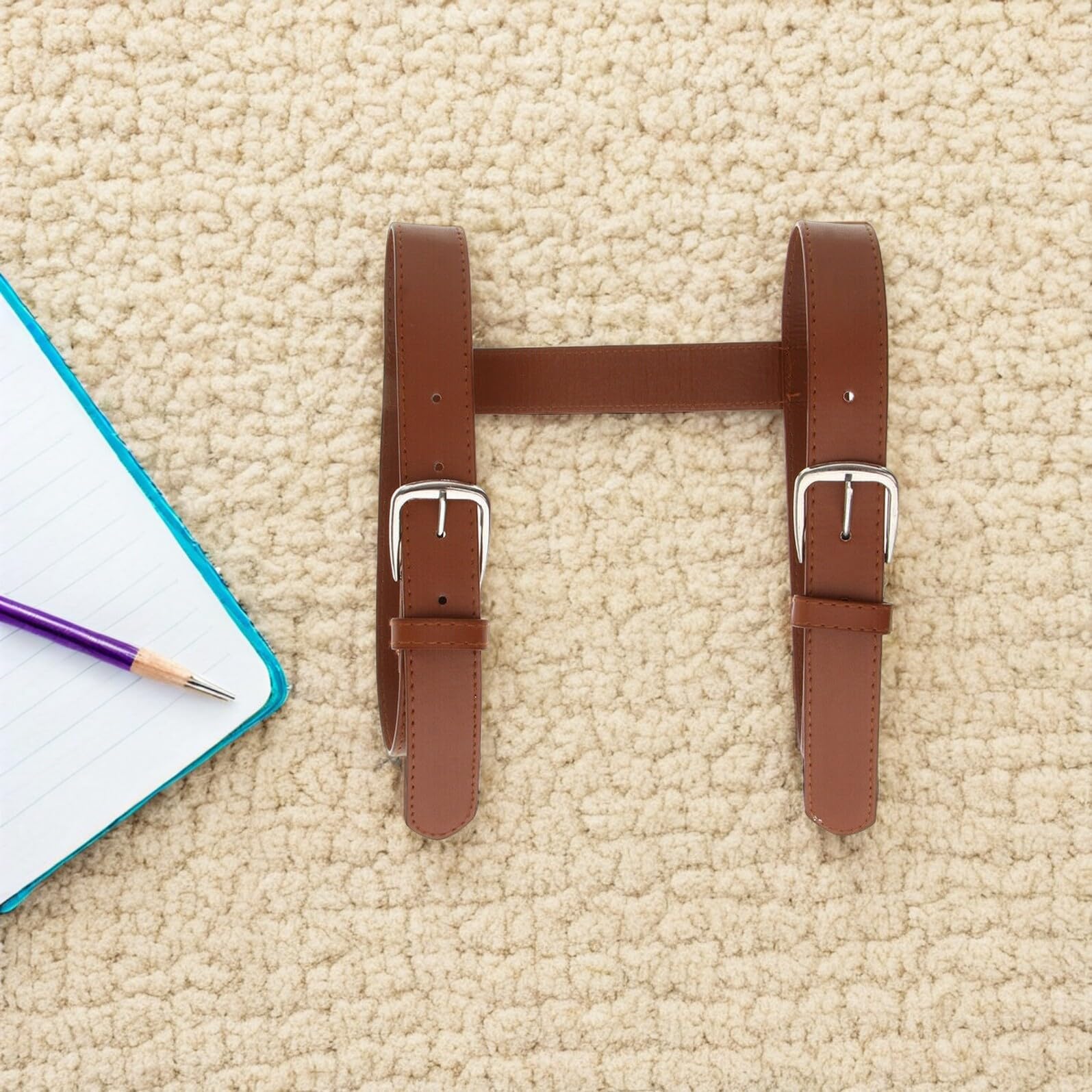 SHOWERORO leather sling features a buckle for hands-free transport.