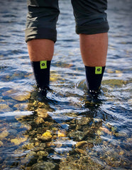 Showers Pass waterproof socks hiking boot in rain demonstrate dry feet on wet trails