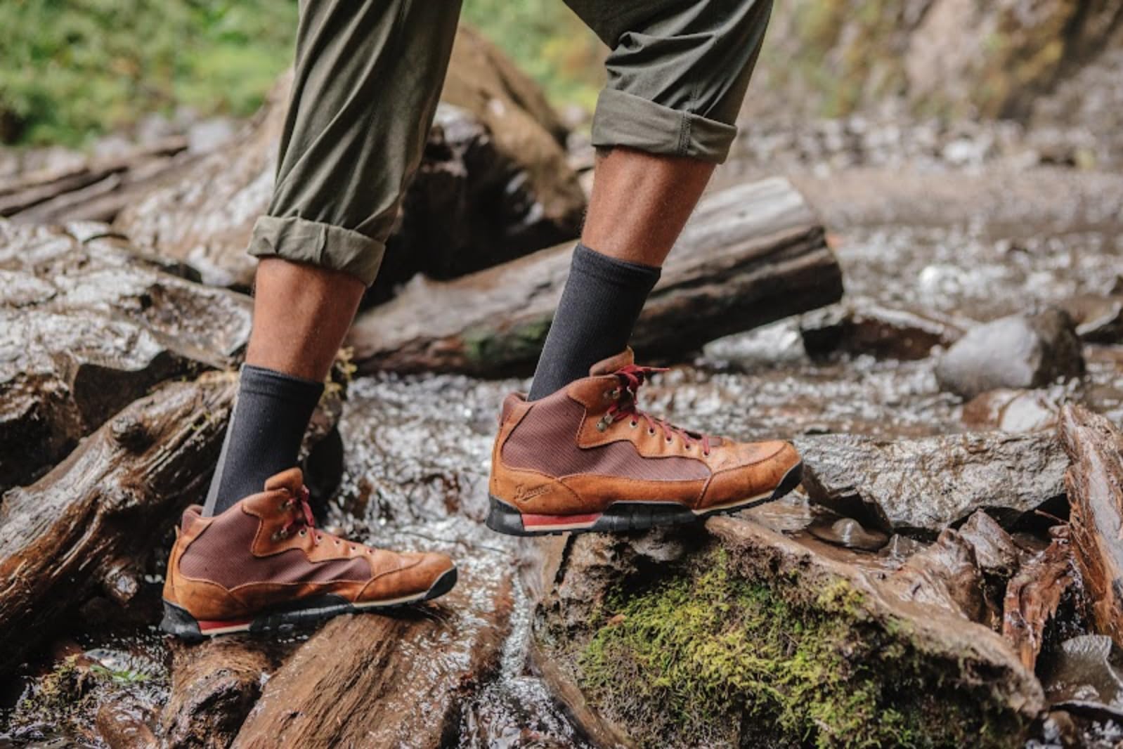 Showers Pass waterproof socks during a snowy run offer warmth and breathability