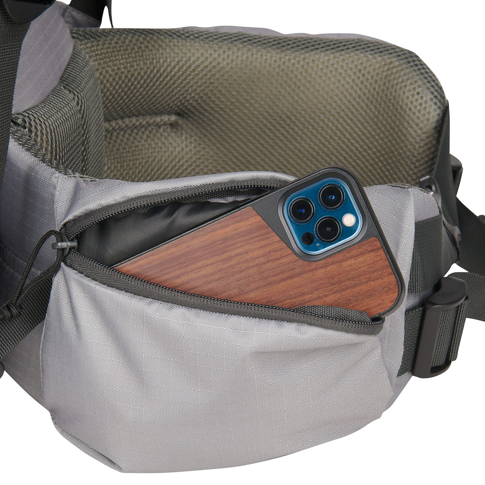 Sierra Designs Gigawatt 60L stash lid keeps small items organized.
