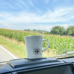 Silwy cups in camping and boat scene with metal coaster for stability.