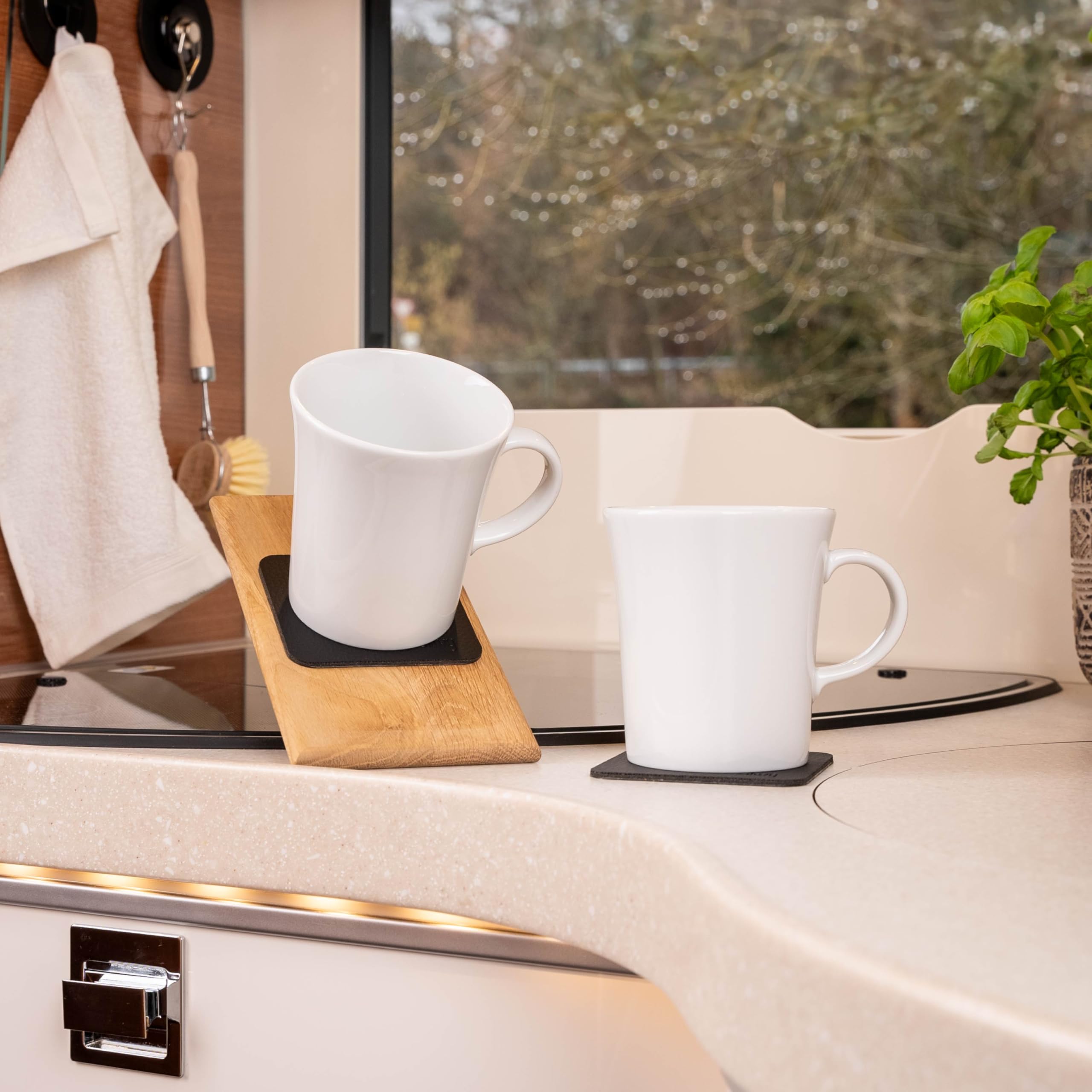 silwy porcelain cups in a boat cabin ready for use