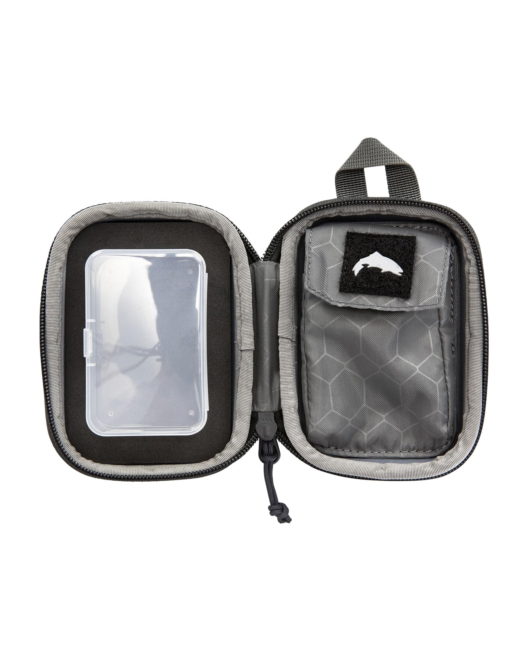 Simms Fish Whistle 2.0 inside dock shows removable container for secure accessory storage.