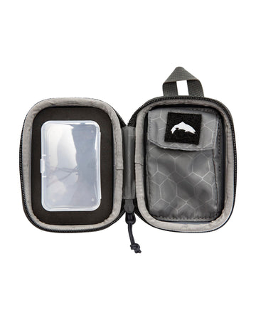 Simms Fish Whistle 2.0 inside dock shows removable container for secure accessory storage.