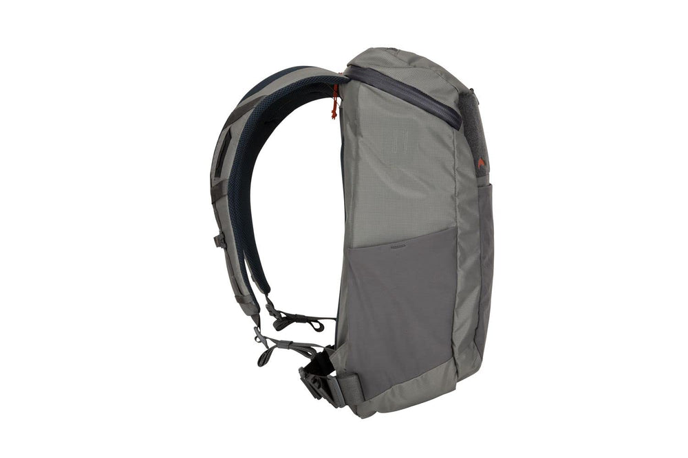 Simms Freestone Backpack Pewter side-pocket detail emphasizes quick-access organization on hikes.