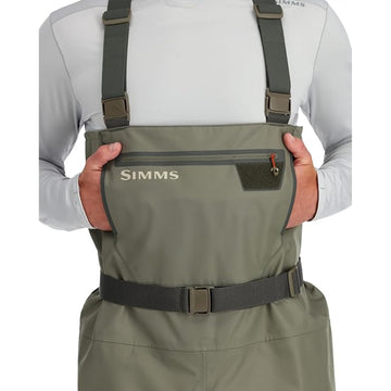 Simms Tributary fleece-lined handwarmer pocket keeps fingers warm between casts.