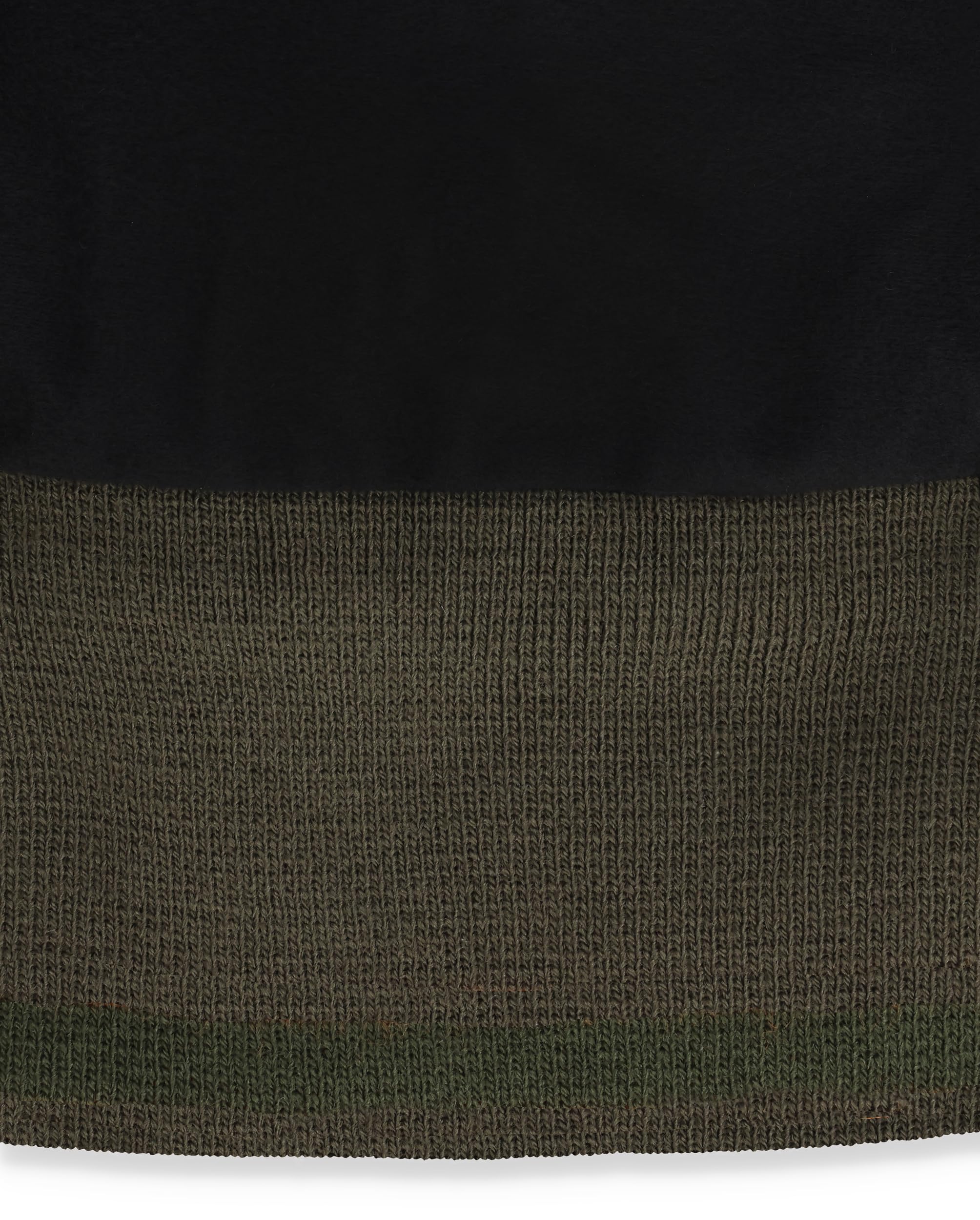 Simms Windstopper Beanie folded for packing, lightweight warmth for travel.