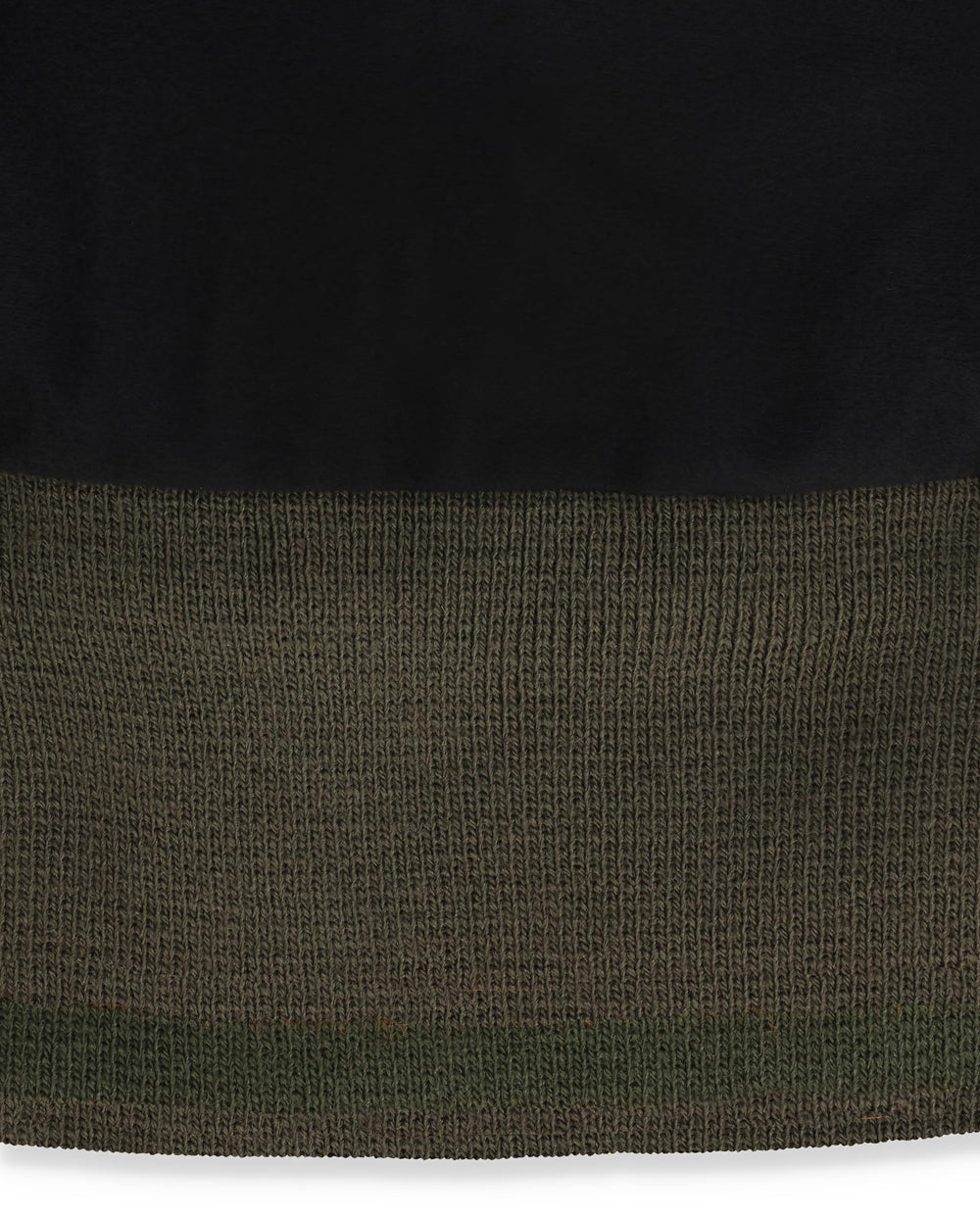 Simms Windstopper Beanie folded for packing, lightweight warmth for travel.