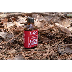 Amber plastic bottle and label for buck urine