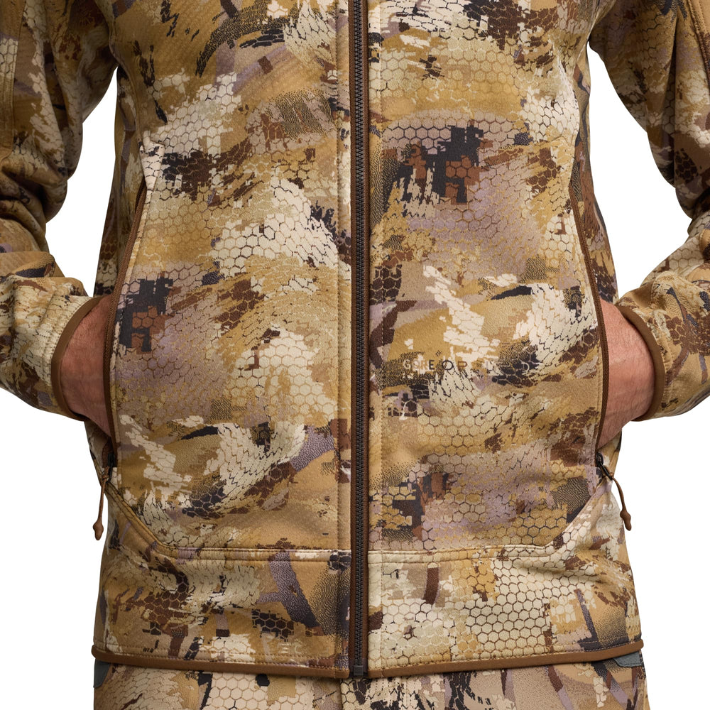 SITKA Alpha Fleece Hooded Jacket demonstrates breathable layering for active moves.