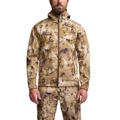 SITKA Alpha Fleece Hooded Jacket highlights moisture-shedding protection in light rain.