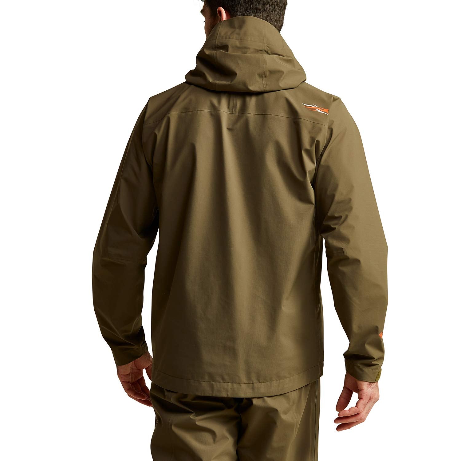 SITKA Dew Point jacket hood deployed in rain for head protection.
