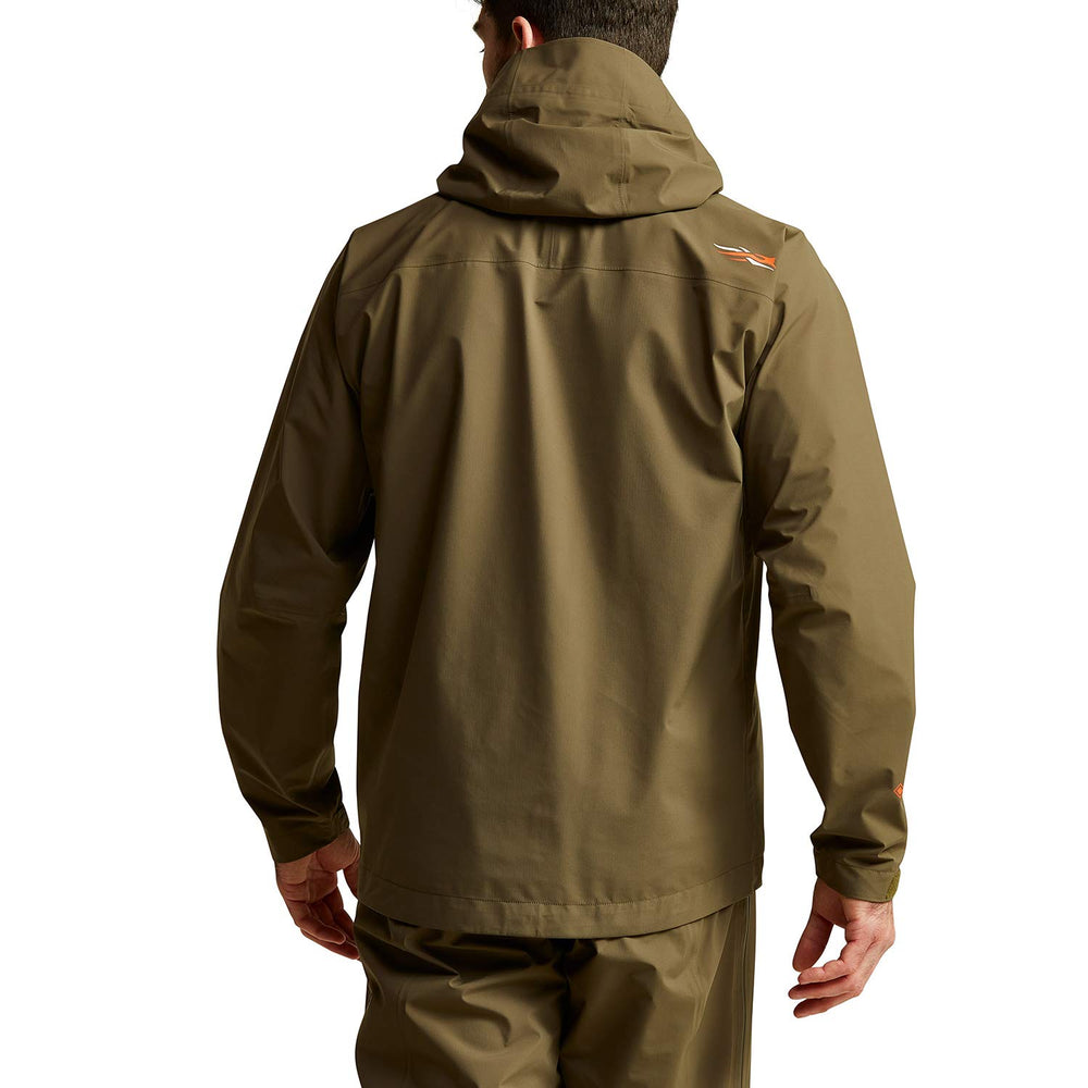 SITKA Dew Point jacket hood deployed in rain for head protection.