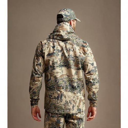 SITKA Dew Point in rugged hunting scenario highlights weather-ready performance and mobility.